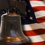 Liberty Bell with us flag behind image