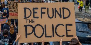 Defund the Police protest sign image