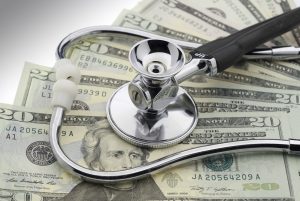 Money and stethoscope image